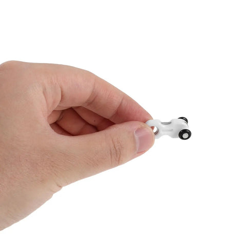 Dead Quiet Curtain Pulley Rollers With Hidden Rail Track And Dual Wheel Design For Heavy Drapes and Zero Hassle Ceiling Mount Hardware, shown in hand.