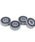 Four Deep Groove Ball Bearing 627-2RS 7x22x7mm Chromium Steel Shielded Double Rubber Cover bearings on white background