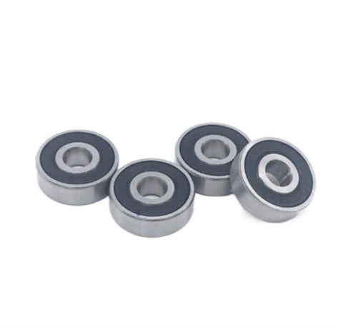 Four Deep Groove Ball Bearing 627-2RS 7x22x7mm Chromium Steel Shielded Double Rubber Cover bearings on white background