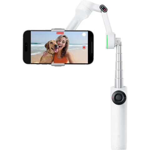 Flow 2 Pro Smartphone Gimbal With 3 Axis Stabilization And AI Tracking, white gimbal holding phone filming woman and dog at beach.