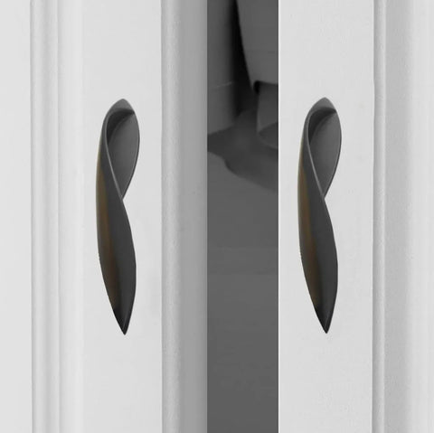 Arcuate Pulls S Shaped Cabinet Handles 5 Inch Center Matte Black Solid Zinc Alloy on white cabinet doors.