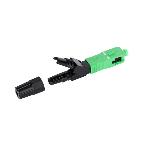 Fiber optic SC/APC quick connector with green housing and black plug, side view