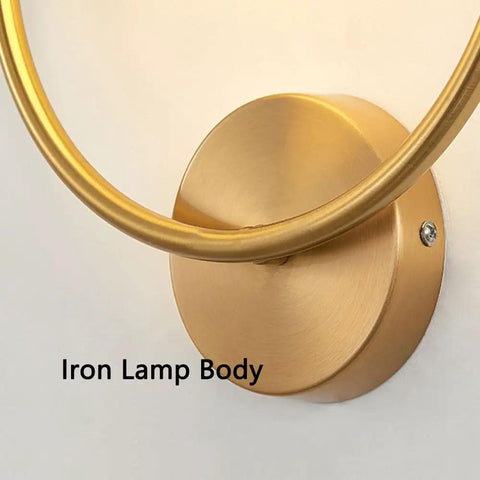 Modern Luxury Sphel Glass lampshade Wall Sconce 9.0 Inch Width den Iron Body close-up of the iron lamp body with gold finish.