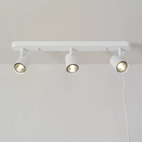 Three Light Plug In Track Lighting With Adjustable Heads In Matte White Finish 22 Inch Length 15 Foot Cord With In Line Switch