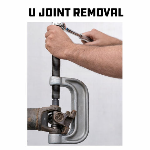 Using Ball And U Joint Service Set 23 Piece Tool Kit Pro Grade for removing U joints with heavy duty C frame.