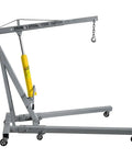 Heavy Duty 2 Ton Hydraulic Engine Hoist And Foldable Shop Crane With Hand Pump for auto repairs, featuring a yellow manual pump.