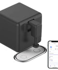 Smart Fingerbot Button Pusher For Rocker Switches And Buttons Wireless App Or Timer Control, black device next to smartphone control