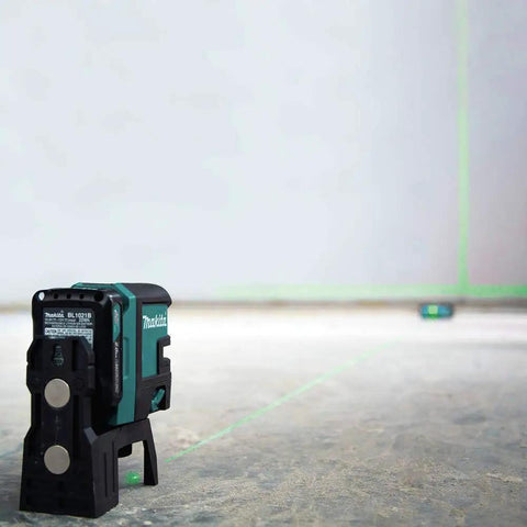 Tough As Nails 12V Max Cordless Self Leveling Green Beam Laser Kit Featuring Four Point Cross Lines on construction site.