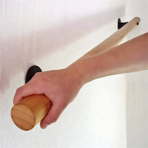 Rock Solid Wood Handrail With Heavy Duty Mount Brackets, adjustable non slip safety grab bar, close up of hand gripping the wood rail.