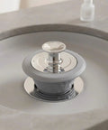 Happyyami Bathtub Drain Stopper Universal Fit 1.1 to 2.0 Inch Silicone in a bathtub sink, featuring a shiny chrome top.
