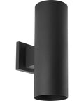 Dope Modern 5 Inch Outdoor Up And Down Wall Lantern In Black Finish Cylinder Collection Exterior Light For Porch Lighting Patio Lighting Or Entryway Weather Resistant Sleek Minimalist Design For Curb Appeal featuring a cylindrical black fixture
