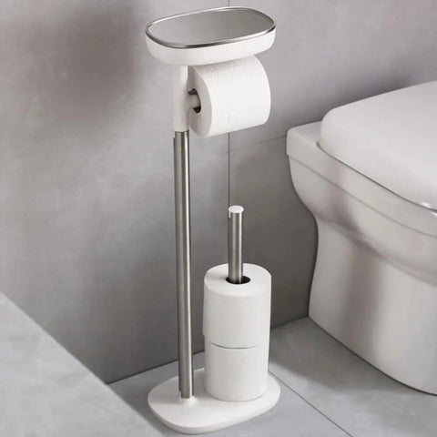 Freestanding Toilet Paper Holder With Shelf And Drawer Holds Up To Four Rolls Weighted Base For Extra Stability Great for Spare Rolls Phone Or Book Stainless Steel Finish beside toilet.