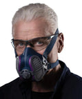 Elipse Mask With P100 Odor Filters For Dust And Fume Protection Pro Grade Lightweight Respirator worn by man with glasses