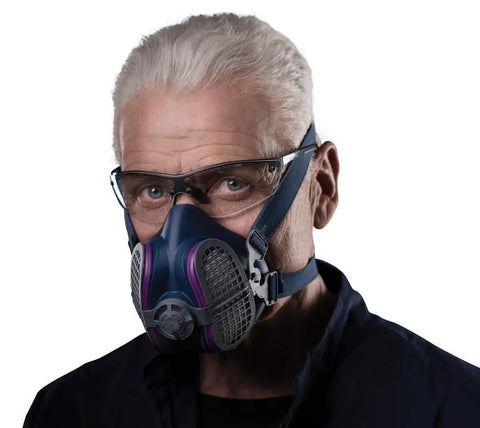 Elipse Mask With P100 Odor Filters For Dust And Fume Protection Pro Grade Lightweight Respirator worn by man with glasses