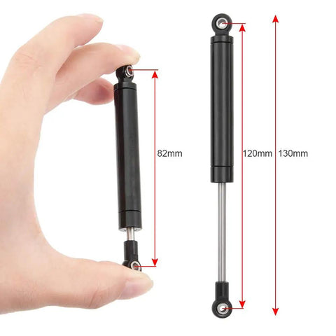 Hand holding 120mm aluminum alloy RC shock absorber, dimensions labeled for 4 Pack 120mm RC Shock Absorbers With Internal Springs For 1/10 Scale Crawlers Aluminum Alloy Beefed Up Upgrade For TRX4 SCX10 II III D90 Gen7 Gen8 HPI HSP Redcat And Other RC Cars