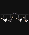 Dope Lofty Industrial Four Light Track Lighting Fixture With Pivoting Heads In Matte Black And Brass Accents on black background
