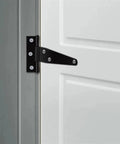 Lightweight Painted Black T Shaped Design Hinge For Fence And Wood Gate, Built For DIYers, mounted on a wooden gate, side view.