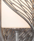 Close-up of Legit One Light Wall Sconce Left Facing In Brushed Steel With Hand Forged Dual Tone Finishes showcasing opal glass.