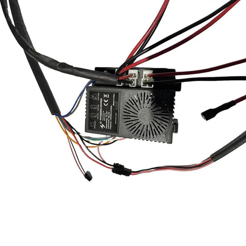 Close-up of High Power DIY 2.4G Harness Conversion Kit for Kids Ride On Toys Upgrade, showing wiring connections with black and red wires.
