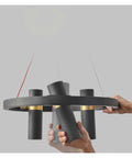 Close-up of industrial style living room pendant lights modern simple restaurant lighting fixtures creative LED hanging lamps in black metal.
