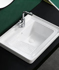 USZWBY Ceramic Laundry Sink - Single Bowl Bathroom Vessel Sink, Semi-Recessed Square Design with Washboard, top view on dark countertop.