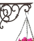Hella Sturdy Rock Solid Cast Iron Wall Mounted Corner Support Brackets With A Killer Vintage Floral Design for hanging planters.