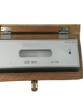 Battle Tested Magnetic Spirit Level Two Hundred Millimeter Length straight in a wooden case, ideal for precise leveling tasks.