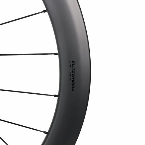Close-up of 50mm Matte Carbon Road Wheelset With Center Lock Disc Brakes 700c Beefy 28mm Rim Fits 25C To 38C Tires UCI Approved