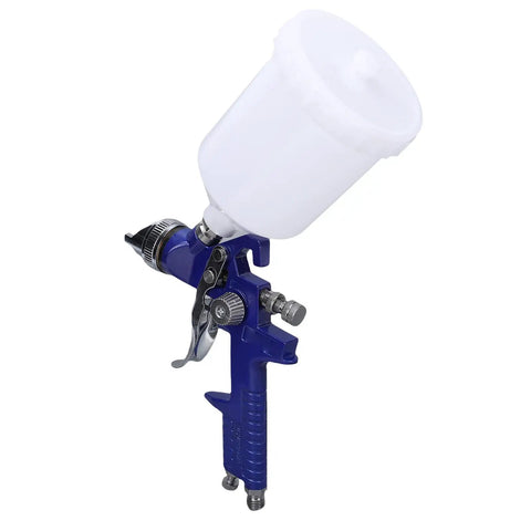 Top Tier Gravity Feed Hvlp Spray Gun With Six Hundred Cc Cup, featuring a blue aluminum body and white cup for paint applications.