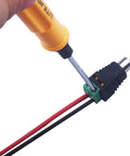 Hand holding a screwdriver connecting Smooth As Butter Rca To Av Screw Terminal Connector Speaker Wire To Rca Adapter.