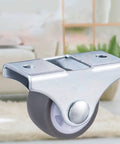 Close-up of 8 Pack Heavy Duty Fixed Caster Wheels with Rigid Non Swivel Base and Ball Bearing Top Plate for smooth rolling.