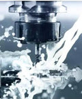 Beefy Straight Collet Milling Chuck Holder For MT4 ER32 Extension Rod in action, showcasing 40Cr construction with coolant spray flow.
