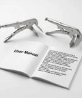 User manual and two Beefy 10 Inch Flat Jaw Locking Clamps For Heavy Duty Sheet Metal Welding And Fabrication visible on table.