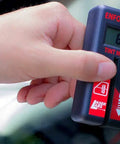 Hand holding Pro Grade Police Window Tint Meter For Accurate Readings, Assembled In USA, NIST Traceable Standards, Black Finish