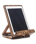 Hand Carved Tree Of Life Cookbook Stand With Adjustable Foldable Reading Holder for Kitchen Office Or Desk Totally Eco Friendly Mango Wood Made In India Gift For Home Chefs And Book Lovers holding a tablet