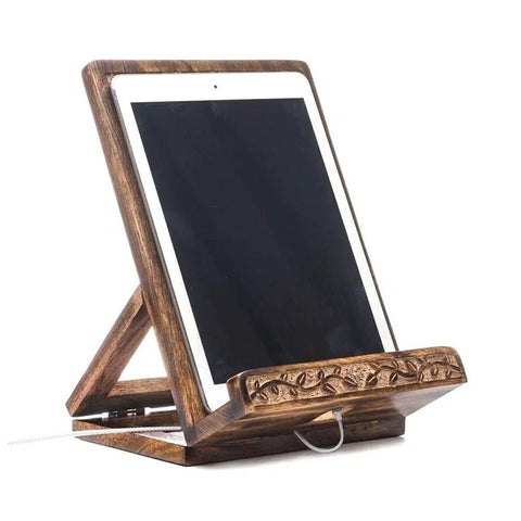 Hand Carved Tree Of Life Cookbook Stand With Adjustable Foldable Reading Holder for Kitchen Office Or Desk Totally Eco Friendly Mango Wood Made In India Gift For Home Chefs And Book Lovers holding a tablet