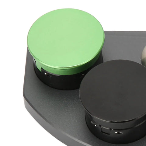 Close-up of Watch Oil Dip Tool With Four Color Ceramic Dishes, showing green and black ceramic dishes on alloy frame.