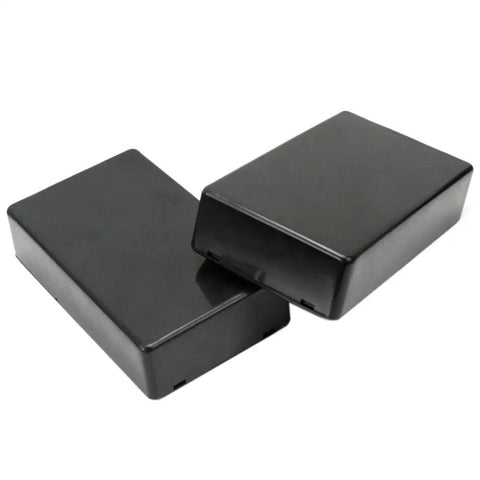 Two black boxes from Five Pack Black Waterproof Plastic Electrical Project Case Junction Box 3.93 x 2.36 x 0.98 Inches Durable Weatherproof Enclosure
