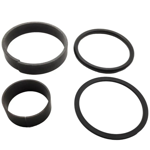 Heavy Duty Hydraulic Cylinder Seal Kit For Ford New Holland And Case IH Farm Gear With Lift Bucket Boom And Tilt Cylinders Replaces 86581665 Older SML40456 Easy Install DIY Friendly Farm Ready Durable Sealing Kit, four durable seals displayed.
