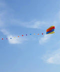 Colorful Parafoil Kite With 118 Inch Long Tail Go-To Outdoor Fun Easy To Fly Includes Handle And Line 20 Inch Frame Great For Beginners And Parks Durable Lightweight Build Eye Catching Fashion Pattern flying against blue sky