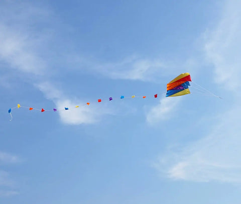 Colorful Parafoil Kite With 118 Inch Long Tail Go-To Outdoor Fun Easy To Fly Includes Handle And Line 20 Inch Frame Great For Beginners And Parks Durable Lightweight Build Eye Catching Fashion Pattern flying against blue sky