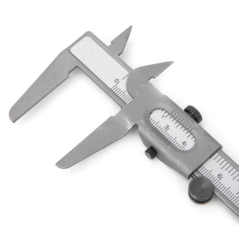 High Precision Vernier Caliper with Dual Metric and Inch Readings, 5 Inch Metal Caliper for Inside and Outside Measurements, Clear Scale Easy Readout Durable Tool for DIY Machinists and Workshop Projects showing close-up of measuring jaws and scale.