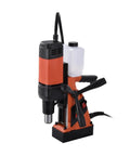 Rock Solid Magnetic Base Drill And Tapper With 1100 Watt Motor, 10 To 35 Mm Range, Tilting Motor Shield, Adjustable Rails, And Built Tough Finish For Zero Hassle Shop Grind in orange and black.