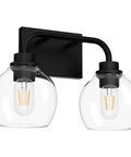 Two light industrial vanity light fixtures over mirror in matte black with clear glass globe vintage farmhouse wall sconces