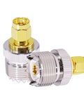 Close-up of PL259 to SMA Male UHF Female Radio Antenna Adapter in brass and nickel, for Ham Radios, CB Radios, Two Pack