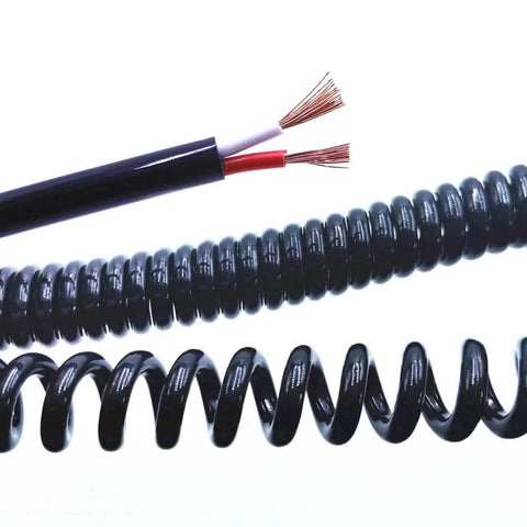 Heavy Duty Coiled Extension Cord That Snaps Back Quick Stretches Twelve Feet For Truck Beds And Workshops Delivers Reliable Three Core Power showing coiled design and inner wires.
