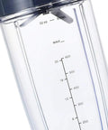 Replacement Cup Kit for 18Oz Short, 24Oz Tall, 32Oz Colossal with Flip Top To Go Lid and Stay Fresh Resealable Lid Fits 600W and Pro 900W Blenders Dishwasher Safe on a 32oz transparent tall cup with measurements visible.