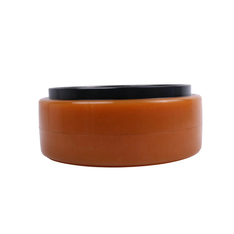 Side view of a brown container with a black lid, likely for cosmetic or skincare use, round shape on a white background.