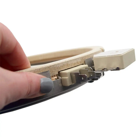 Close-up of a hand holding a 12 Inch Dual Radiant Surface Element Replacement For Range Cooktop Direct Fit WB30T10130 1474216.