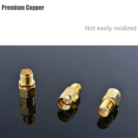 4 Pack SMA Male To RP SMA Female Adapter Connectors For RF Coax Cables, copper adapters on reflective surface